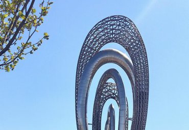 大型不锈钢镂空圆环景观雕塑