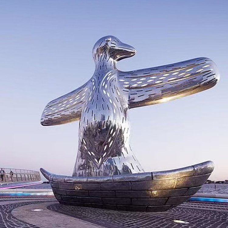 企鹅之舞户外大型不锈钢抽象镂空雕塑图片