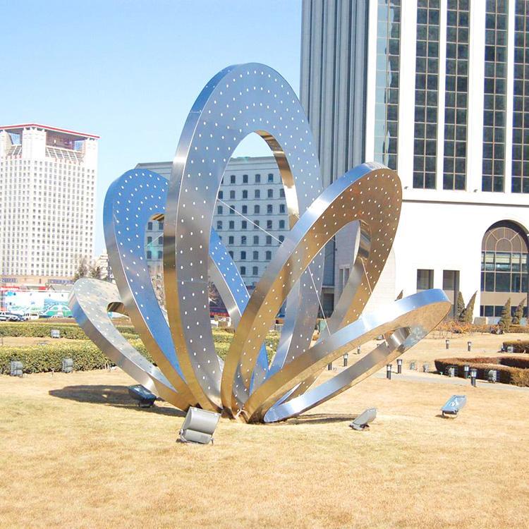 公园创意镂空大型不锈钢圆环雕塑图片