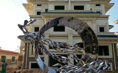 别墅小区不锈钢镜面几何创意抽象鱼群圆环雕塑，是一种…