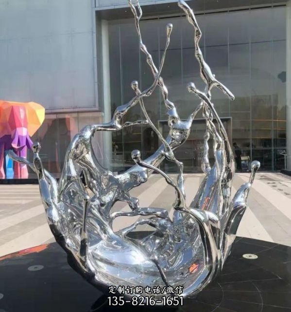 现如今，不锈钢镜面抽象海浪喷泉水景观雕塑在广场户外…