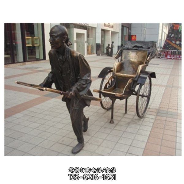 城市街道广场拉黄包车的铜雕人物景观