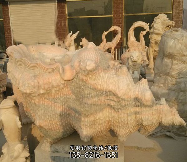 街道边摆放的花岗岩石雕创意海螺雕塑